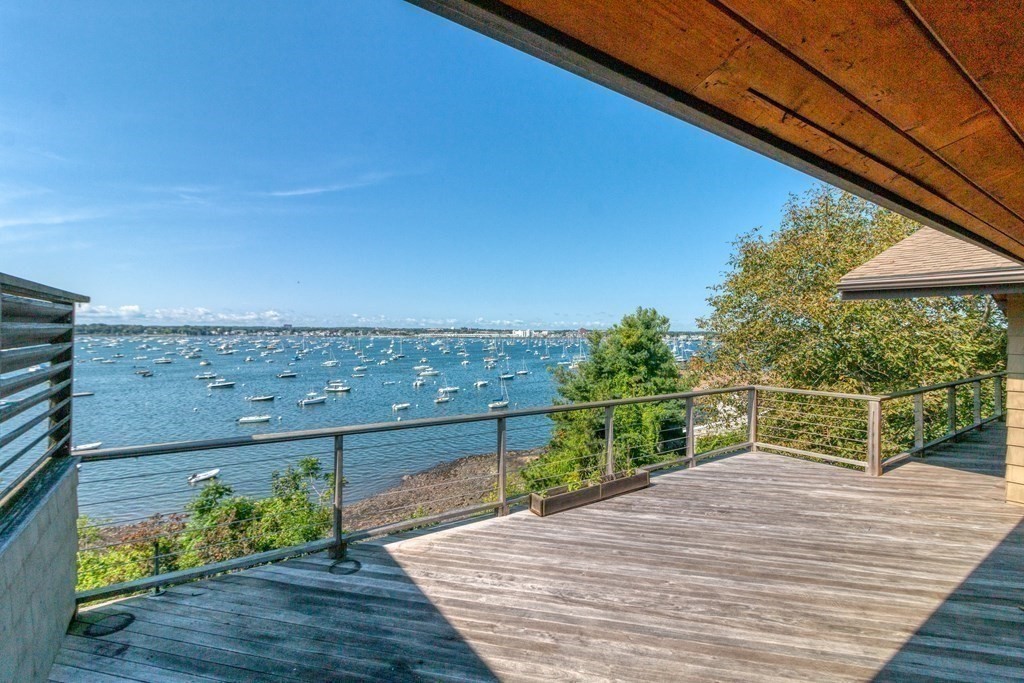 19 Kenneth Road Marblehead, MA 01945 - Photo 4 of 35 a view of a terrace with a bench