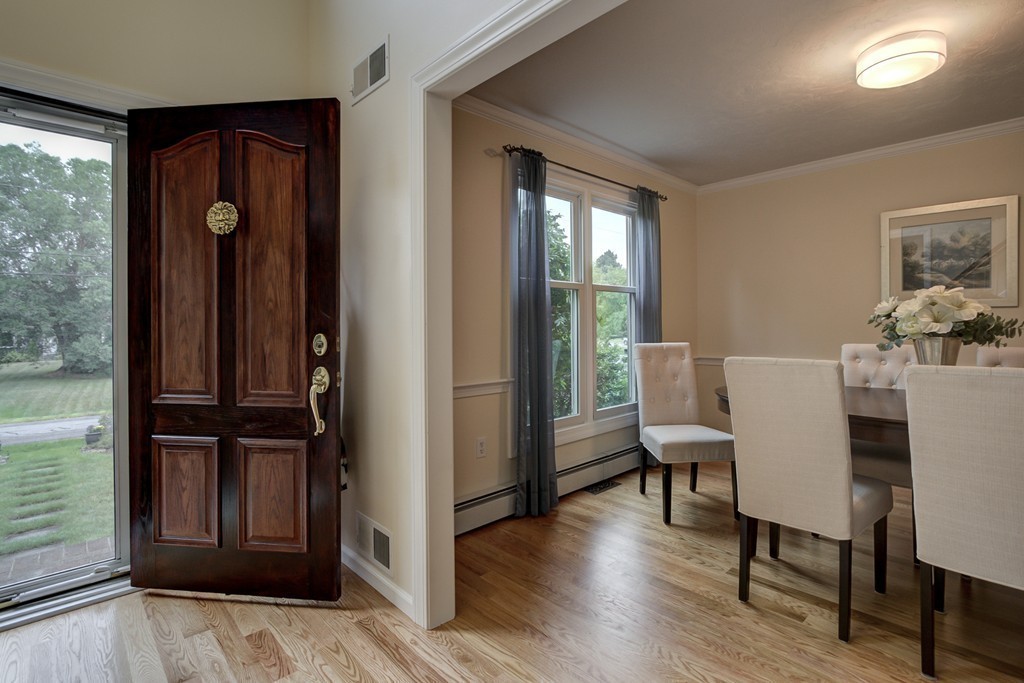 37 Edgewood Road Southborough, MA 01772 - Photo 16 of 29 a view of a dining room with furniture and wooden floor
