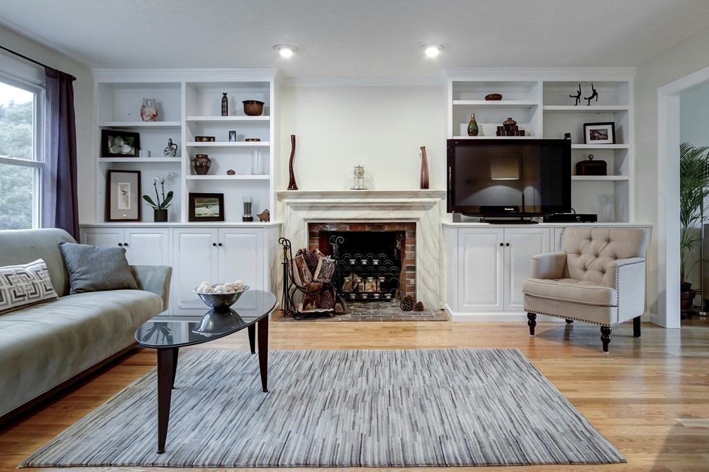37 Edgewood Road Southborough, MA 01772 - Photo 2 of 29 a living room with furniture and a flat screen tv