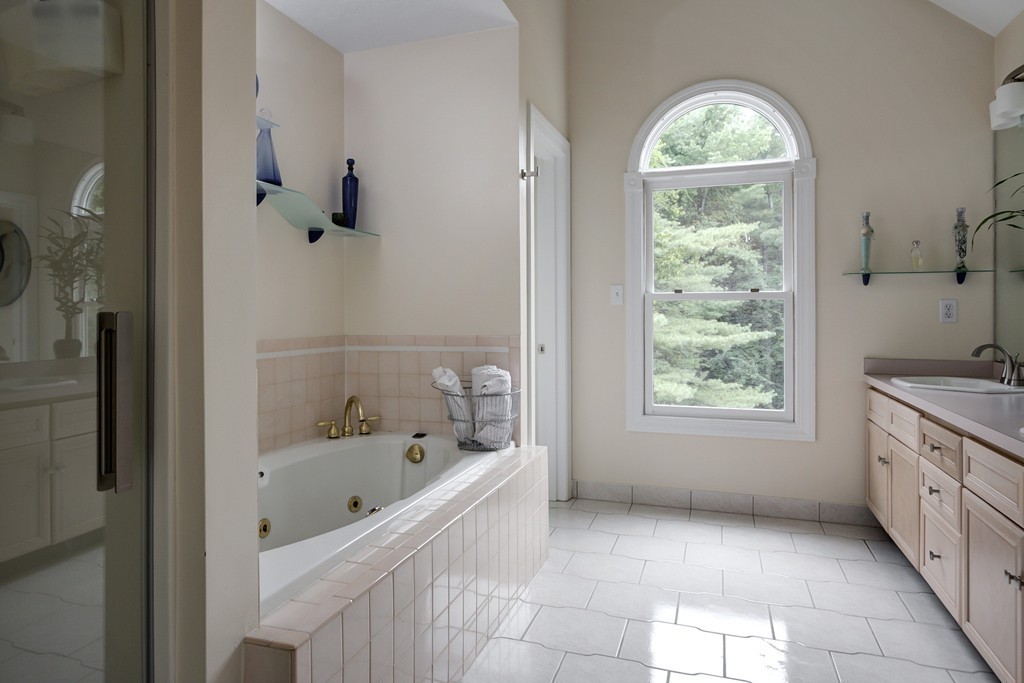 37 Edgewood Road Southborough, MA 01772 - Photo 22 of 29 a spacious bathroom with a tub sink and mirror