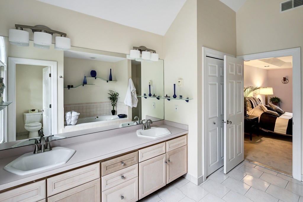37 Edgewood Road Southborough, MA 01772 - Photo 23 of 29 a en suite bathroom with a granite countertop sink and a mirror