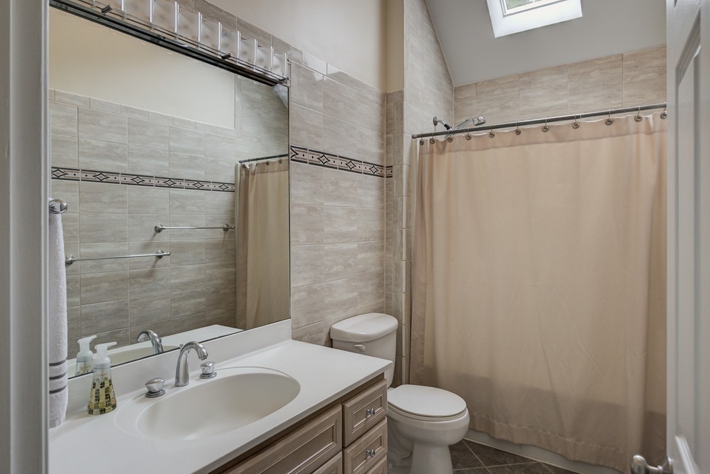 37 Edgewood Road Southborough, MA 01772 - Photo 27 of 29 a bathroom with a sink toilet and shower