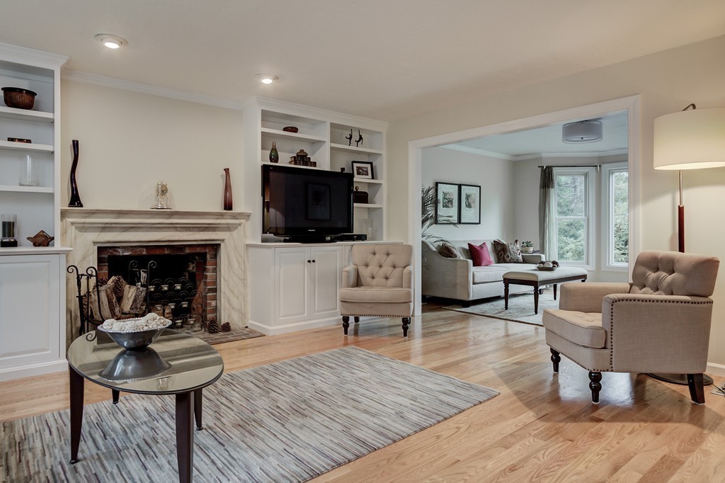 37 Edgewood Road Southborough, MA 01772 - Photo 7 of 29 a living room with furniture a fireplace and a flat screen tv