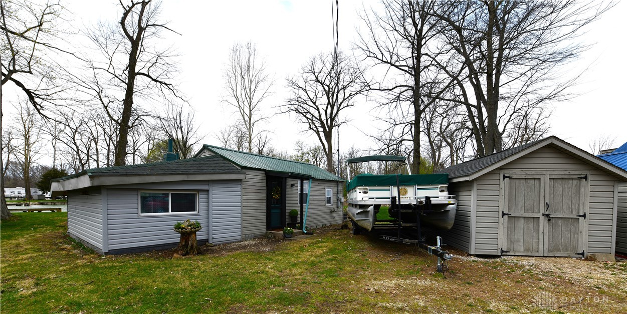5445 Behm Road, Unit 15 Celina, OH 45822 - Photo 45 of 49 This property features a quaint home complemented by useful outbuildings and a boat for recreation.
