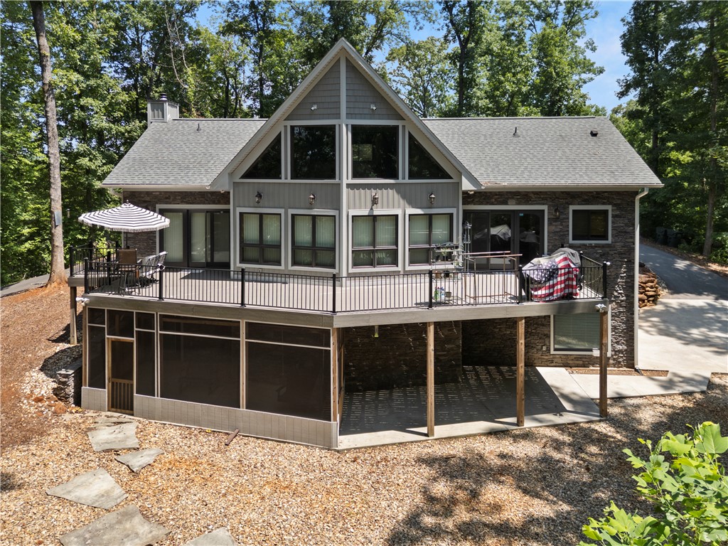 332 Two Rivers Drive Westminster, SC 29693 - Photo 1 of 50 A striking home with a spacious deck and screened-in porch