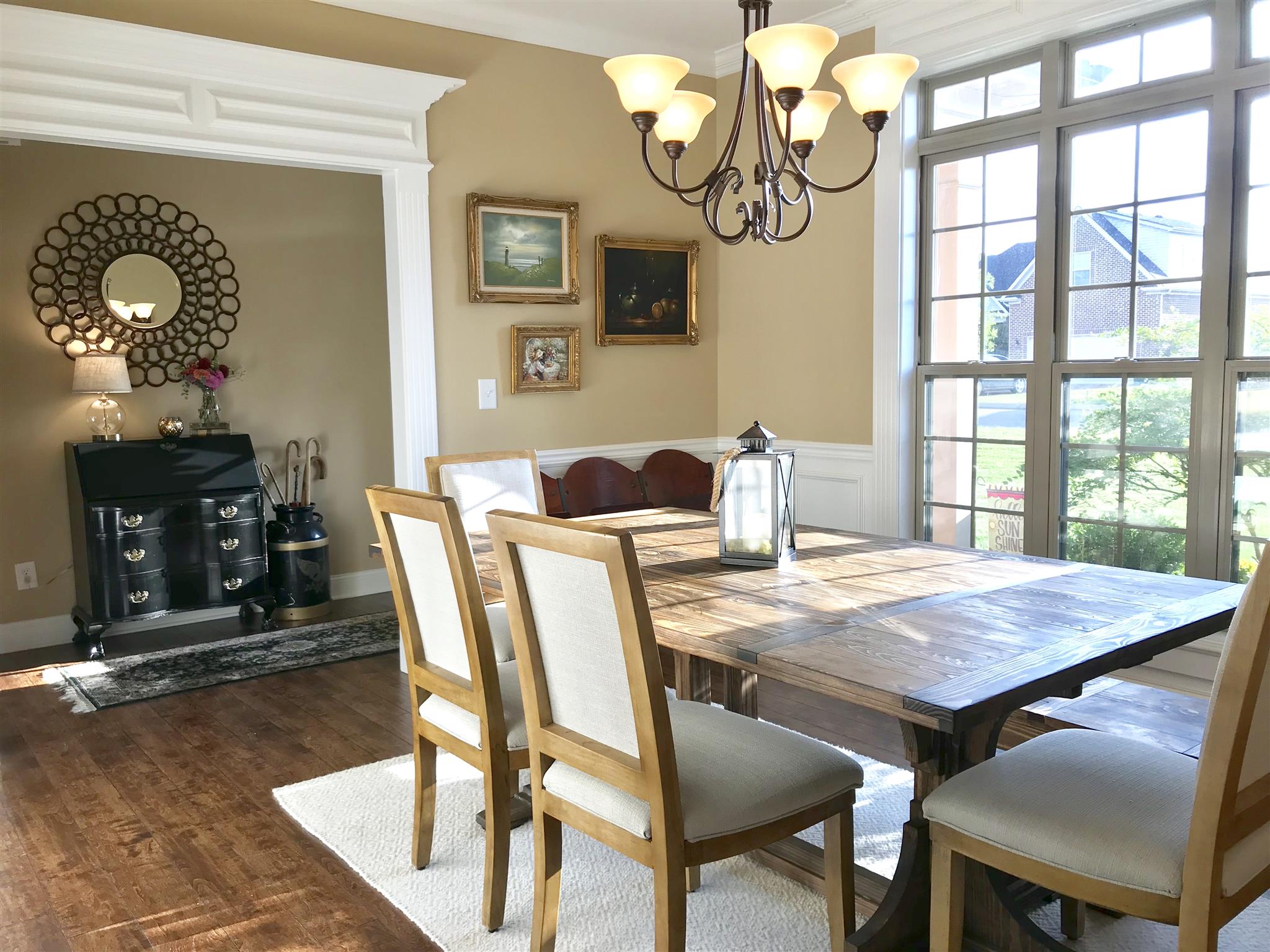 1235 Rimrock Road Smyrna, TN 37167 - Photo 4 of 28 Spacious dining room with wainscoting, wood floors, and floor to ceilings windows flooding the room with natural sunlight all day
