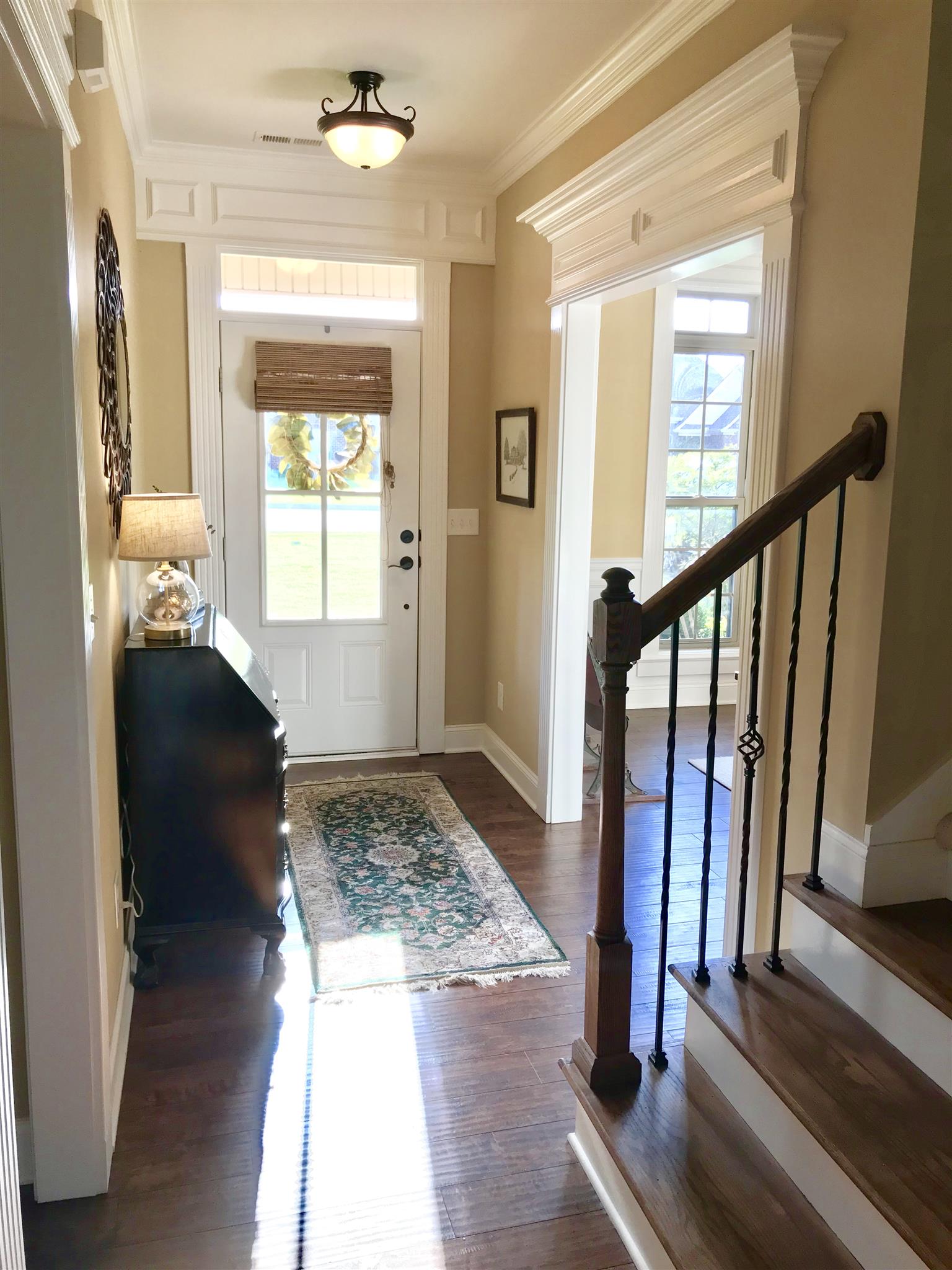1235 Rimrock Road Smyrna, TN 37167 - Photo 5 of 28 Spacious foyer with gorgeous laminate wood floors and extensive trim