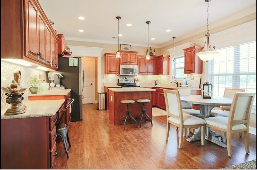 1235 Rimrock Road Smyrna, TN 37167 - Photo 9 of 28 Spacious kitchen with granite counters, recessed lighting and tile backsplash