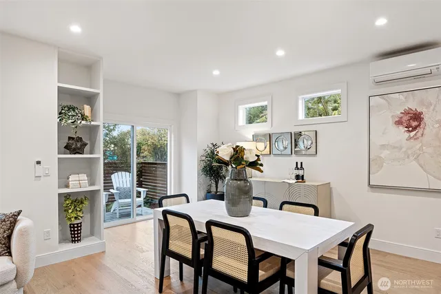 a view of a chair and tables in the patio