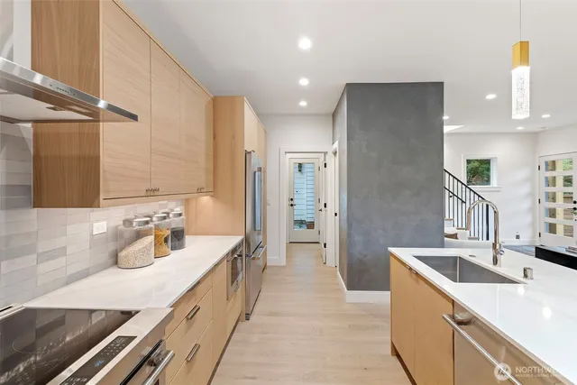 a bathroom with a shower and a window