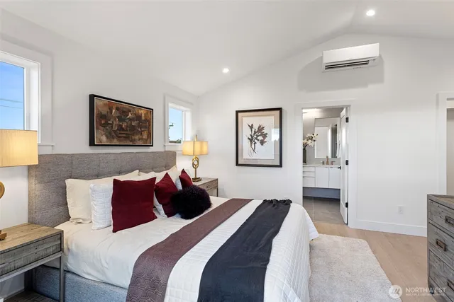 a bathroom with a double vanity sink mirror and shower