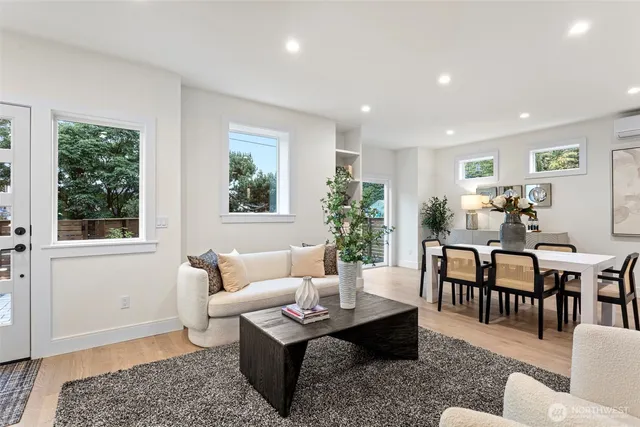 a living room with furniture and a table