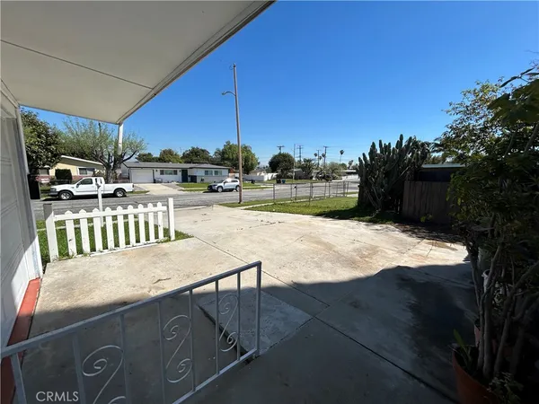 a view of a backyard and a patio