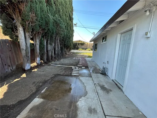 a view of a yard with an outdoor space