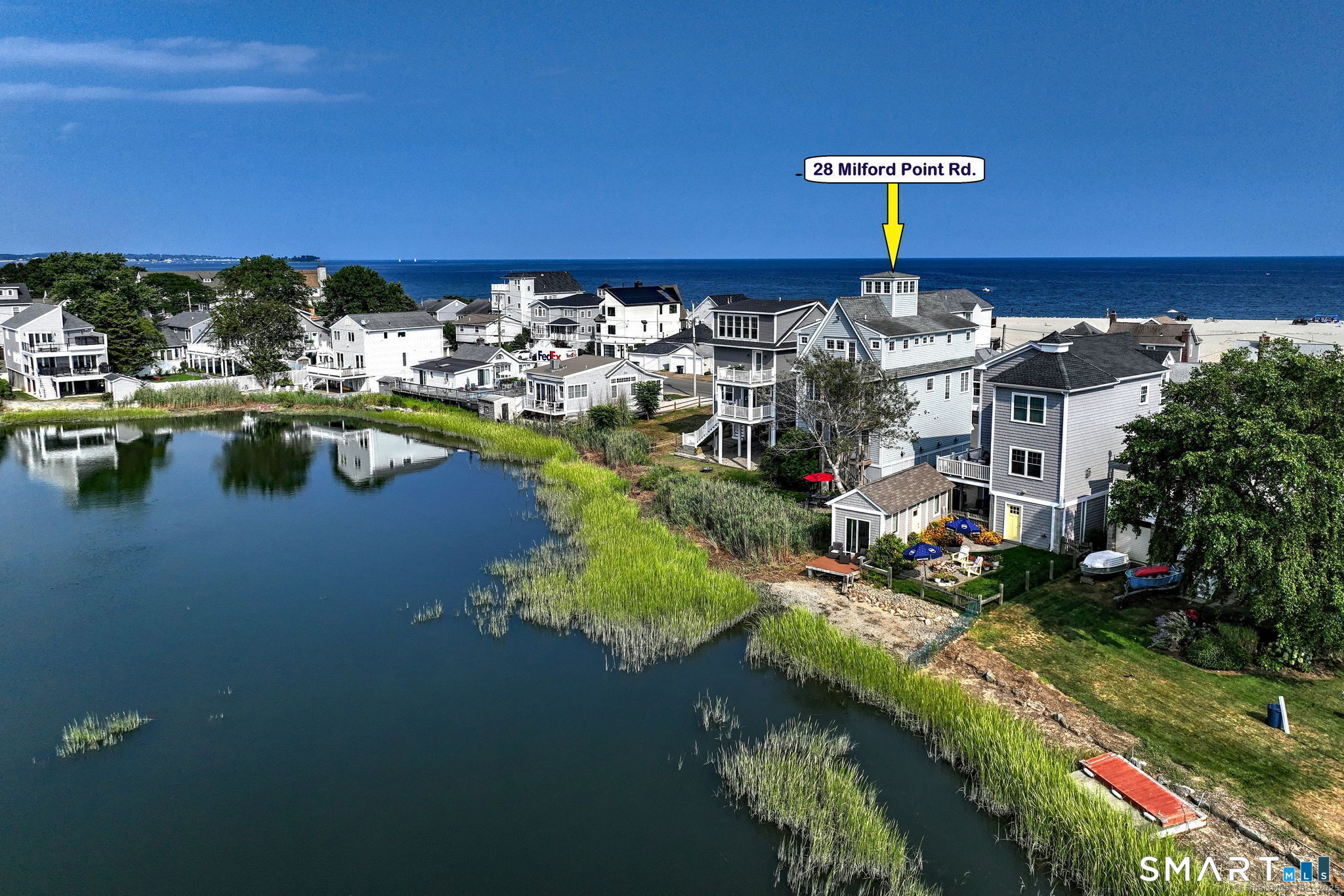 28 Milford Point Road Milford, CT 06460 - Photo 1 of 40 Captivating water views of Long Island Sound and Wheeler Marsh.