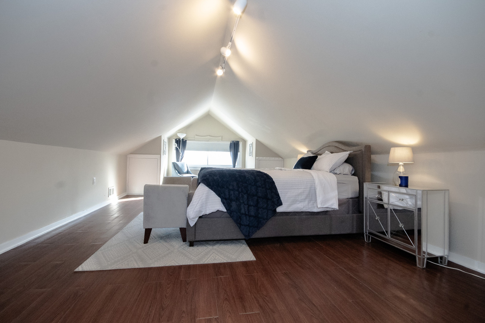 2614 Euclid Avenue Berwyn, IL 60402 - Photo 17 of 30 a living room with furniture and a wooden floor