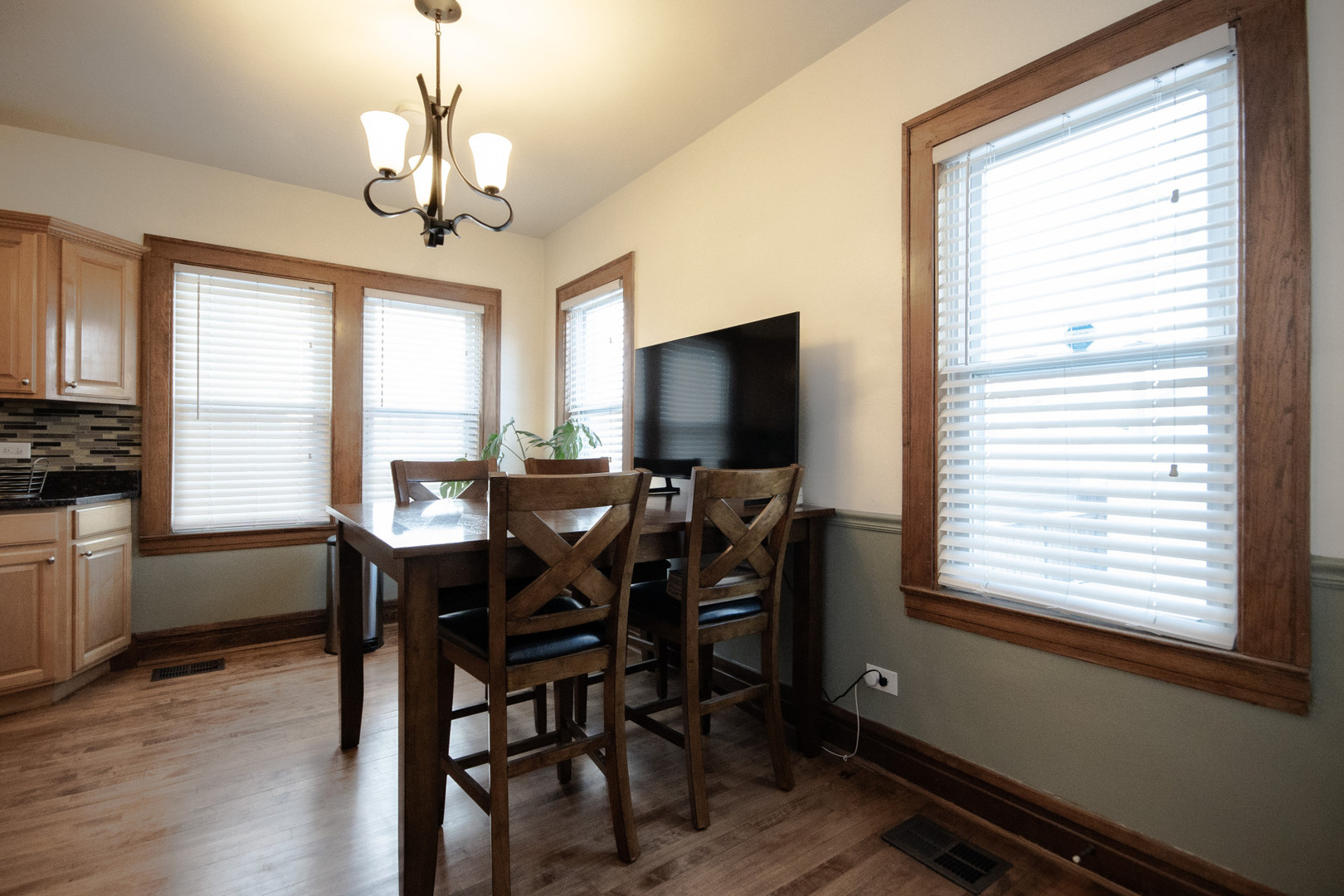 2614 Euclid Avenue Berwyn, IL 60402 - Photo 8 of 30 a view of a dining room with furniture window and wooden floor