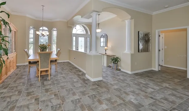 a view of a livingroom with furniture and windows