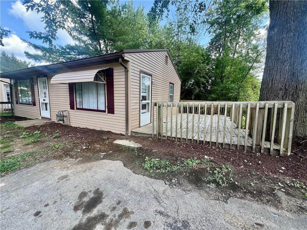 2722 Old Plank Road New Castle, PA 16105 - Photo 2 of 12 a view of a house with a yard