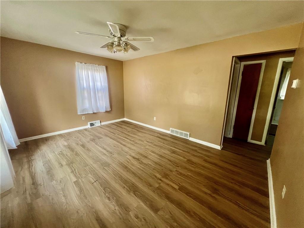 2722 Old Plank Road New Castle, PA 16105 - Photo 6 of 12 a view of an empty room with a window