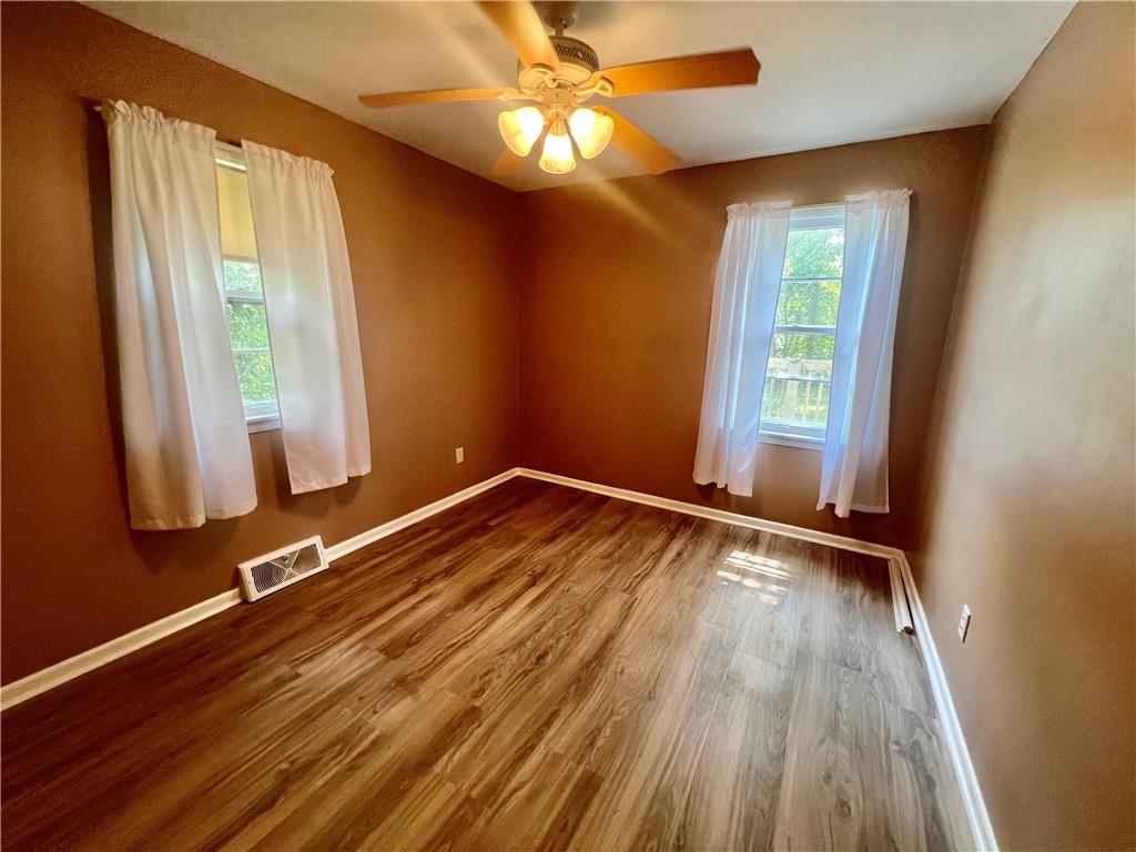 2722 Old Plank Road New Castle, PA 16105 - Photo 10 of 12 a view of room with window and wooden floor