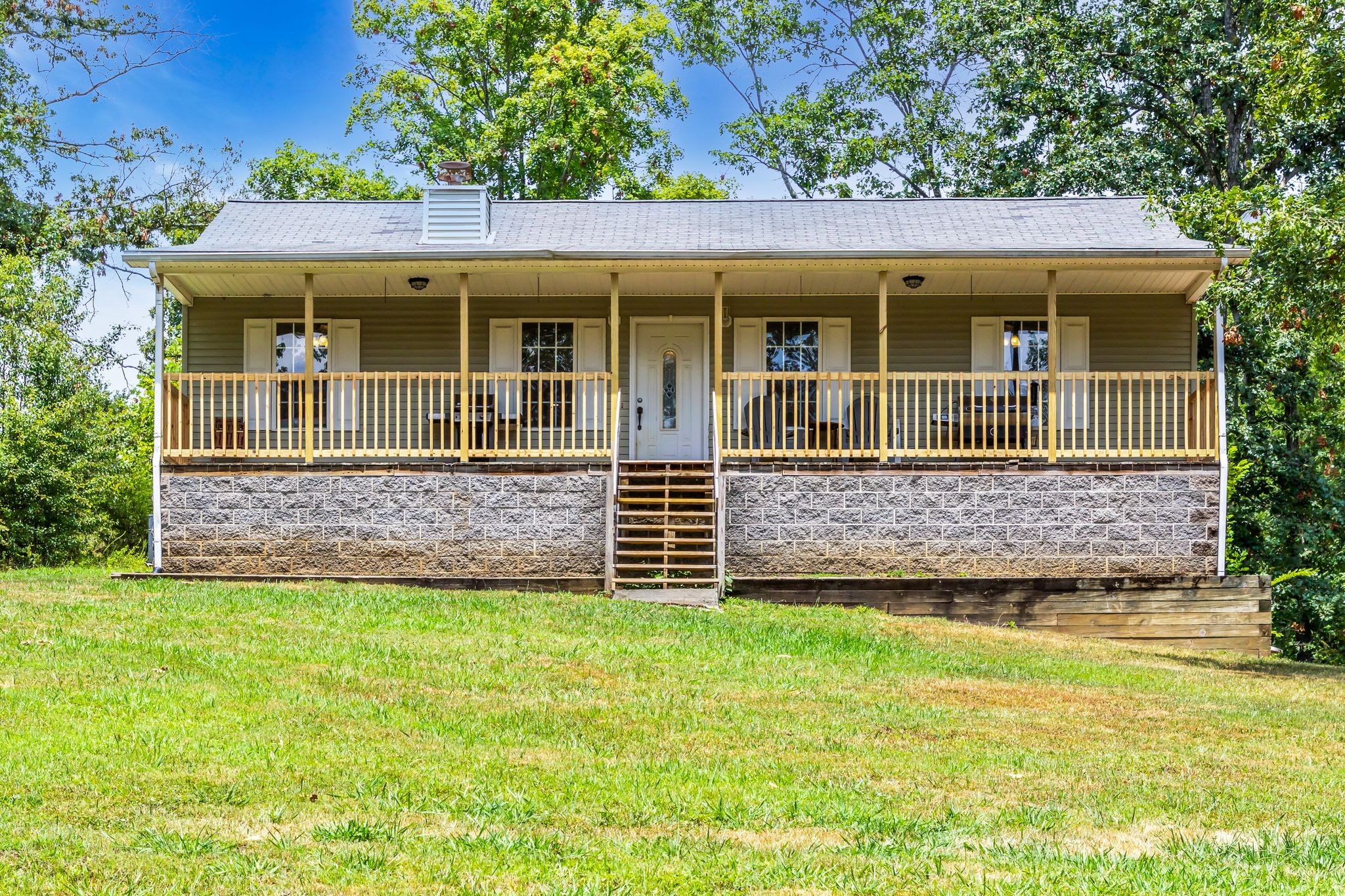 1450 Pleasant Hill Road McMinnville, TN 37110 - Photo 1 of 33 a view of a house with a garden