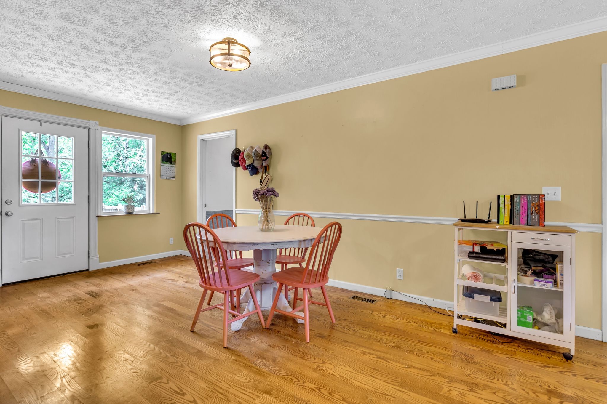 1450 Pleasant Hill Road McMinnville, TN 37110 - Photo 14 of 33 a view of a dining room with furniture a rug and wooden floor