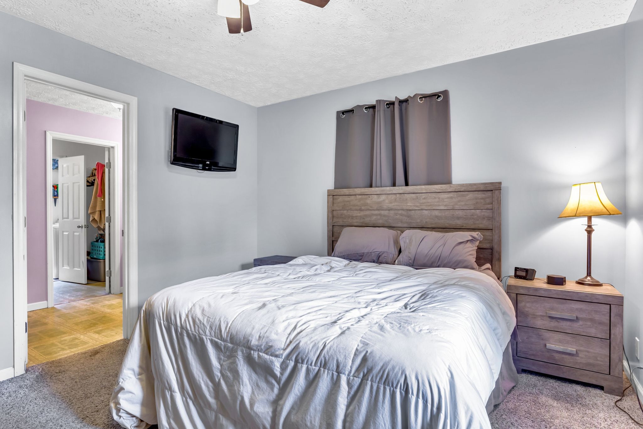 1450 Pleasant Hill Road McMinnville, TN 37110 - Photo 16 of 33 a bedroom with a bed and a tv