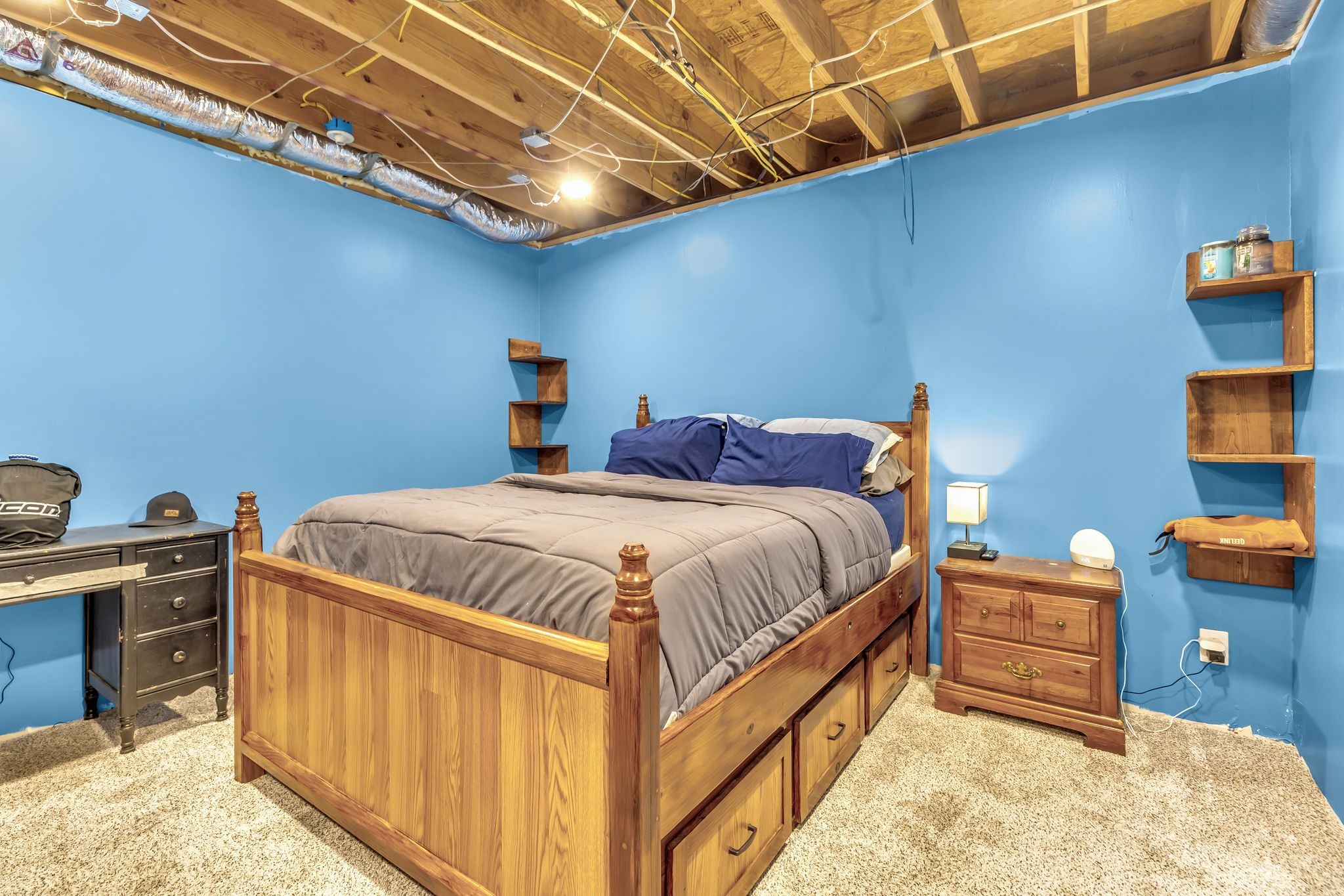 1450 Pleasant Hill Road McMinnville, TN 37110 - Photo 25 of 33 a bed sitting in a bedroom next to a window