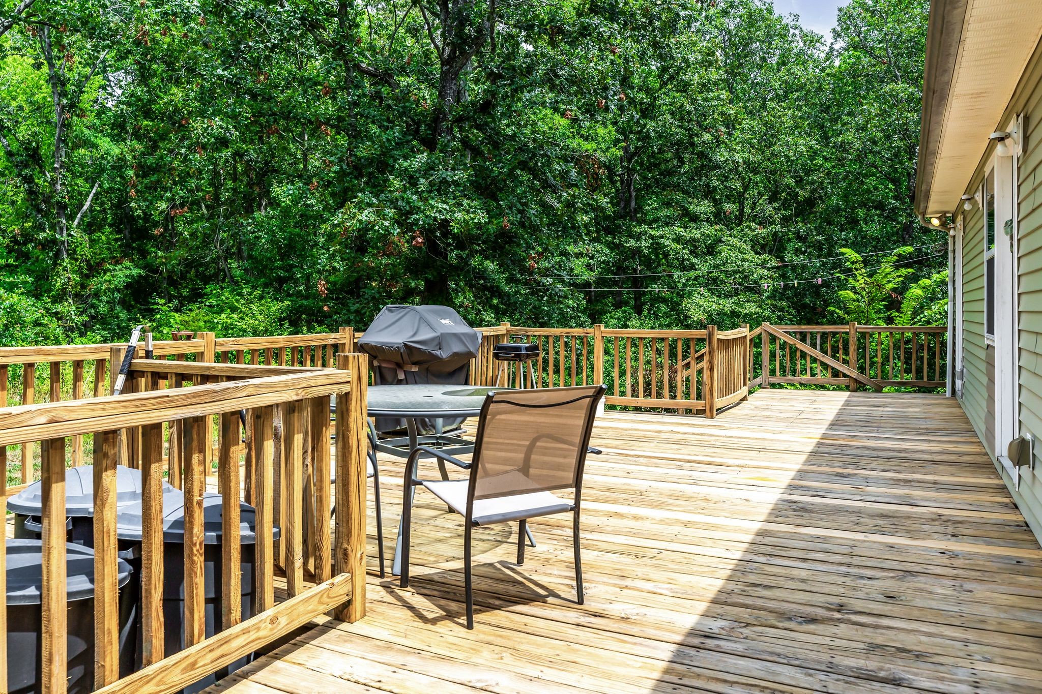 1450 Pleasant Hill Road McMinnville, TN 37110 - Photo 28 of 33 a view of a chairs and table on the wooden deck