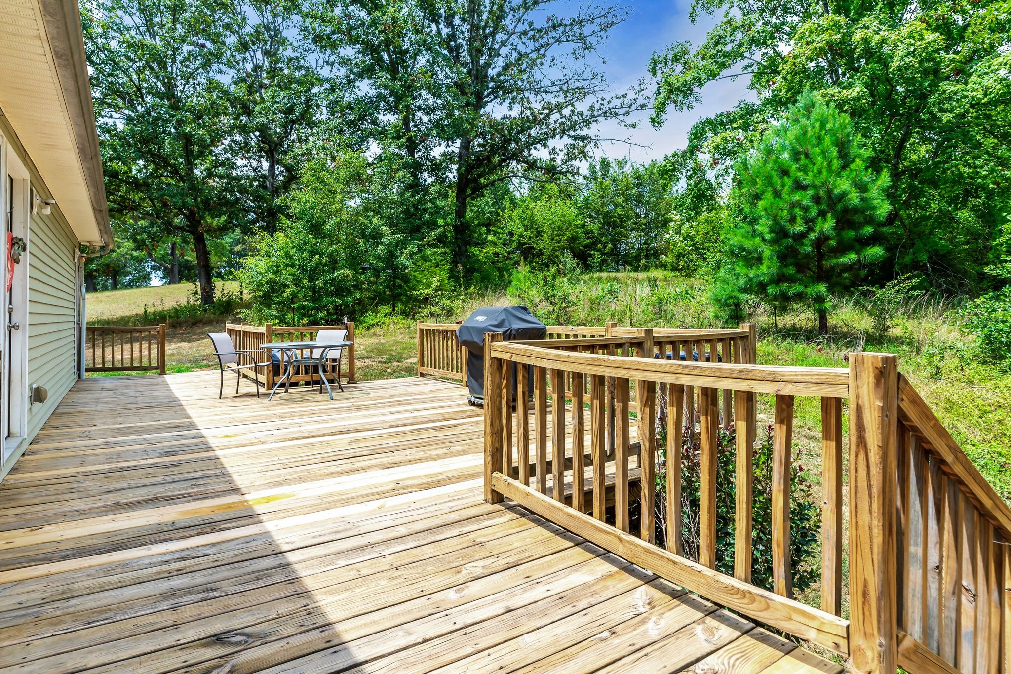 1450 Pleasant Hill Road McMinnville, TN 37110 - Photo 29 of 33 a view of outdoor space with deck and trees