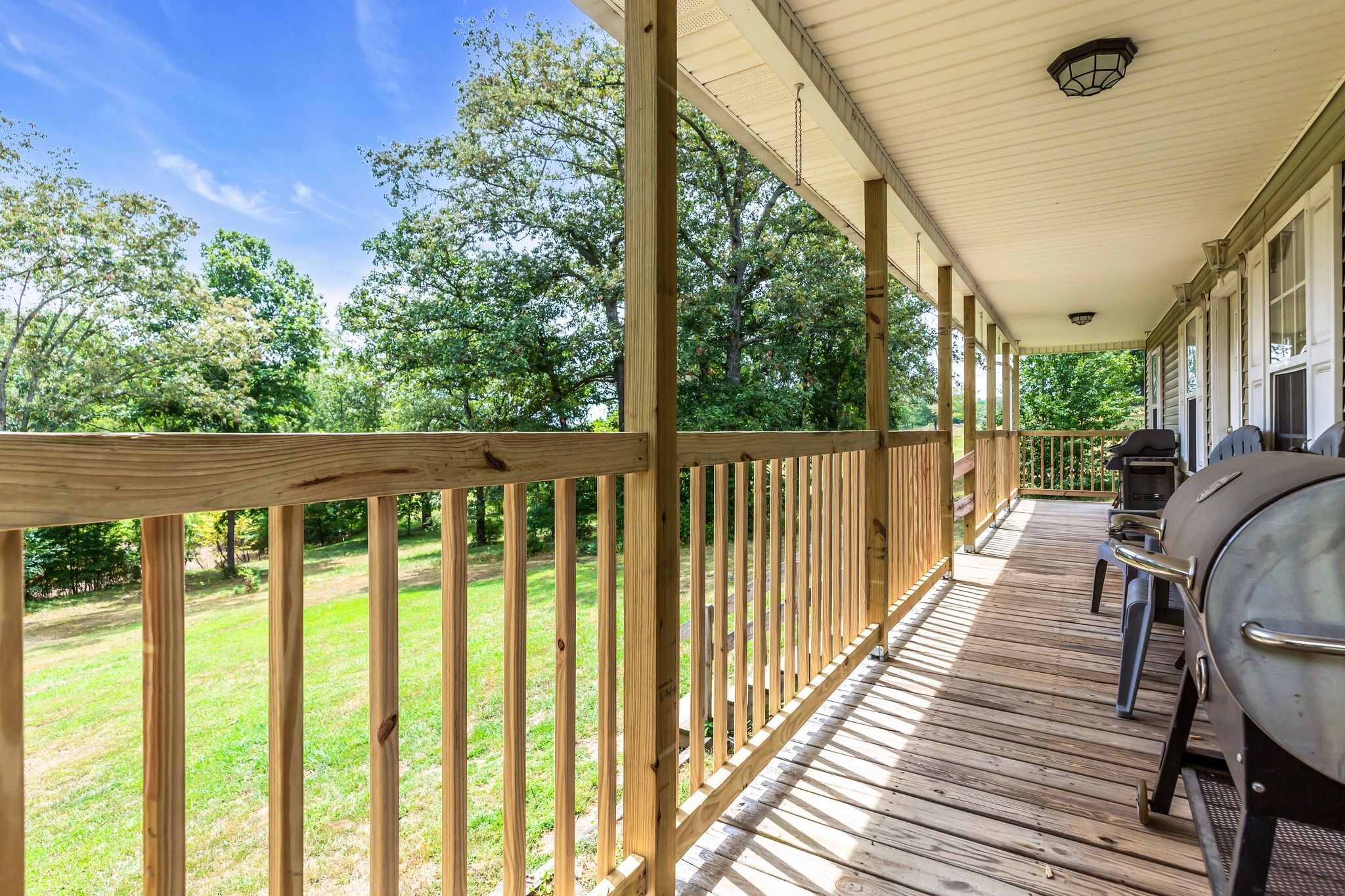 1450 Pleasant Hill Road McMinnville, TN 37110 - Photo 3 of 33 a view of a balcony with wooden floor