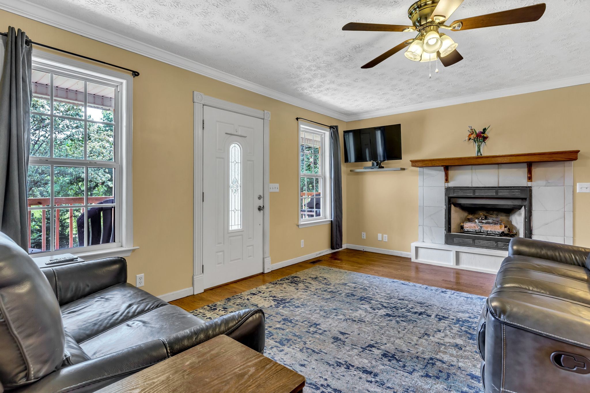 1450 Pleasant Hill Road McMinnville, TN 37110 - Photo 6 of 33 a living room with furniture and a fireplace