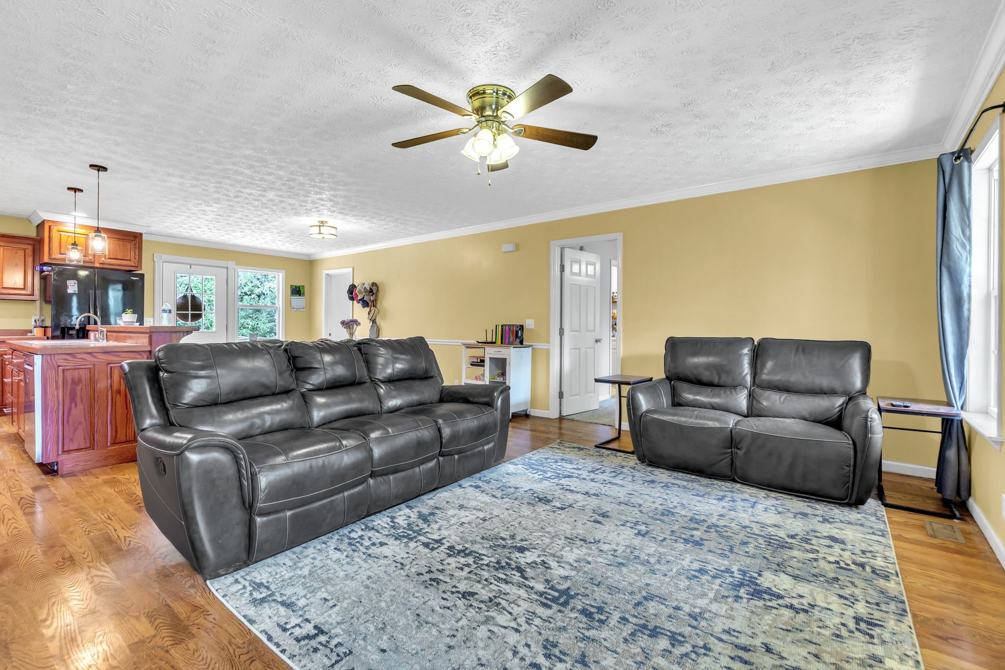1450 Pleasant Hill Road McMinnville, TN 37110 - Photo 9 of 33 a living room with furniture and a chandelier