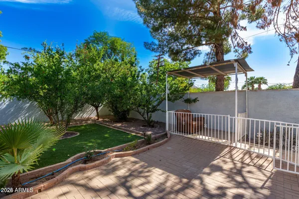 a view of a deck with a backyard