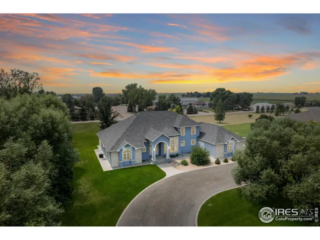 a view of a house with a big yard