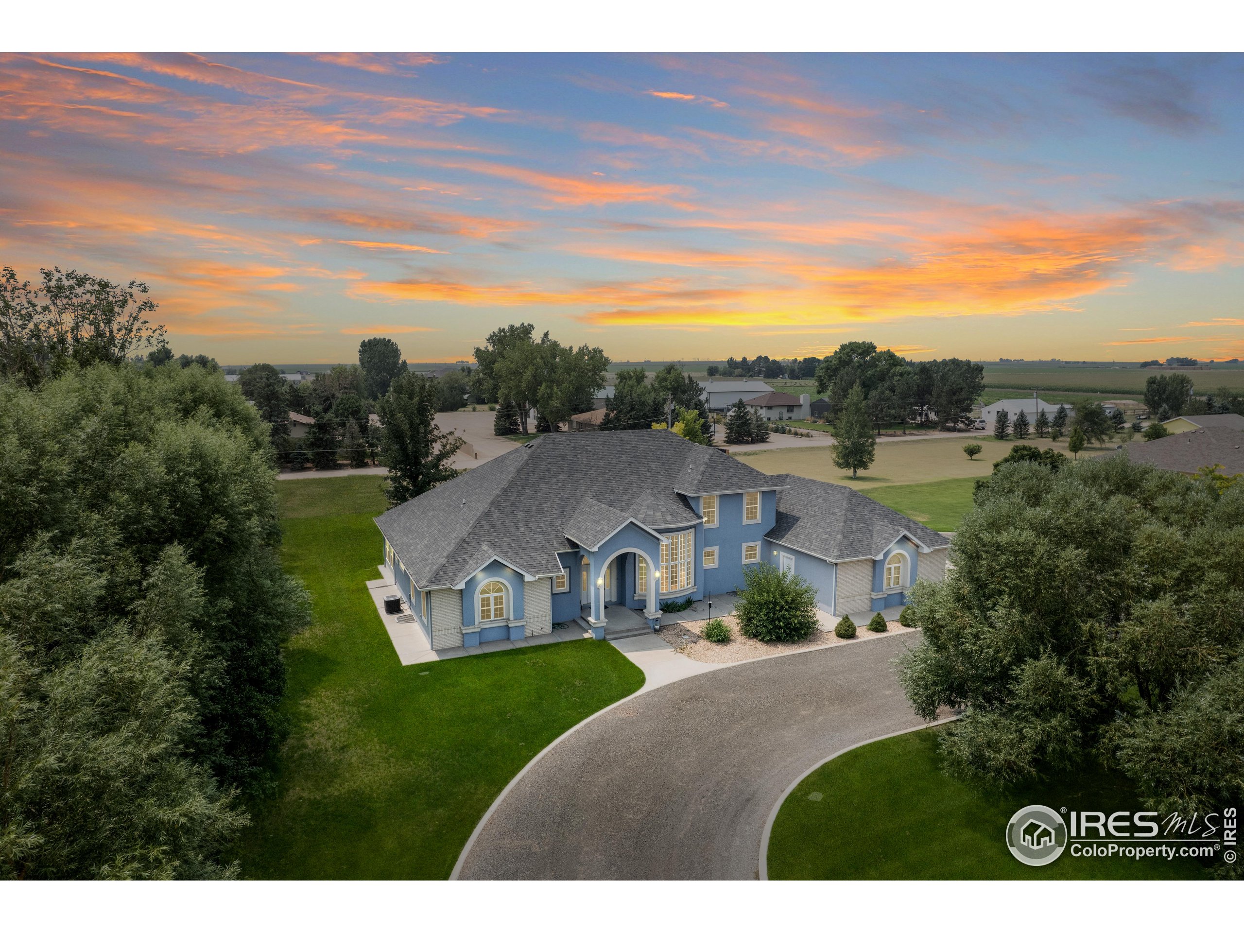 a view of a house with a big yard