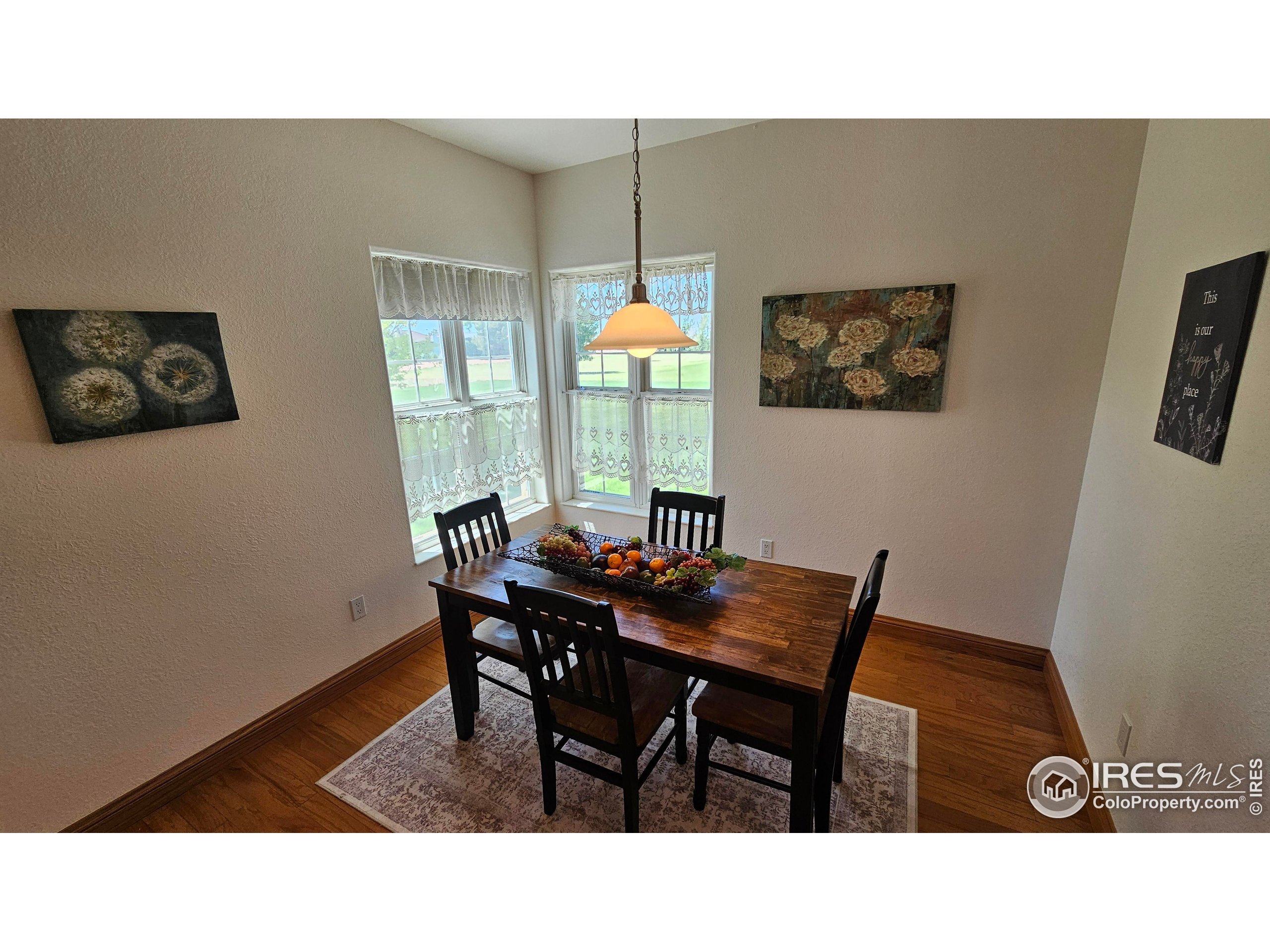 17606 County Rd Q.8 Fort Morgan, CO 80701 - Photo 18 of 37 a kitchen with a table and chairs in it