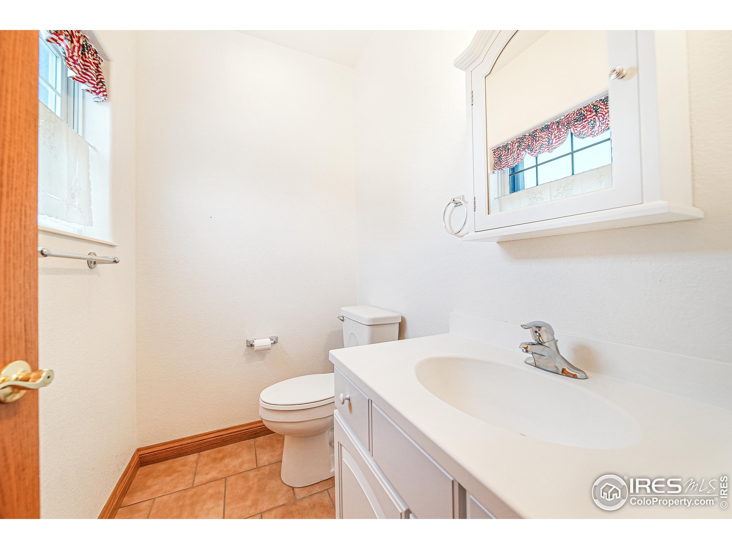 17606 County Rd Q.8 Fort Morgan, CO 80701 - Photo 3 of 37 a bathroom with a sink and a toilet