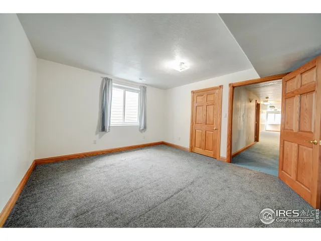 a bathroom with a sink mirror vanity and toilet