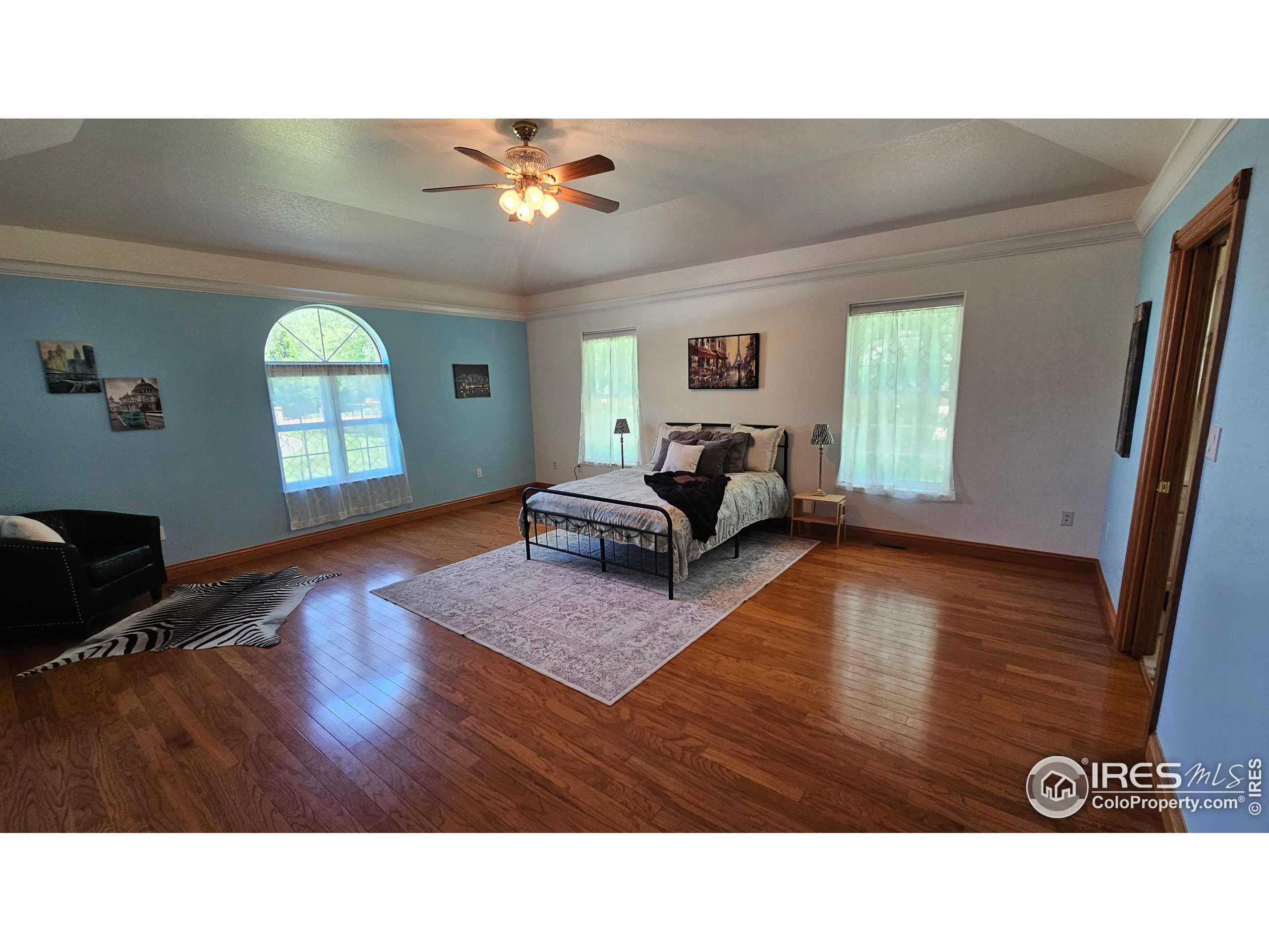 17606 County Rd Q.8 Fort Morgan, CO 80701 - Photo 5 of 37 a living room with furniture and a large window
