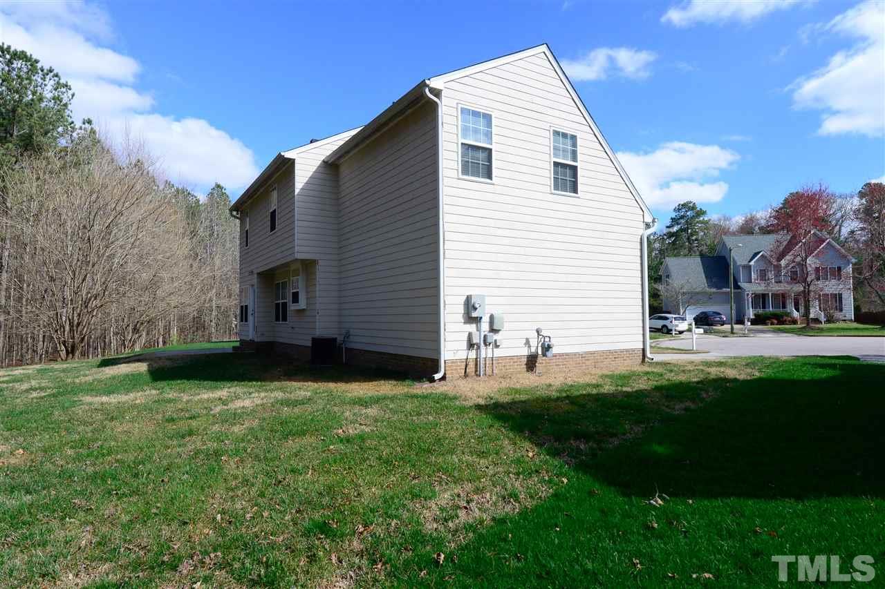 1102 Haventree Road Durham, NC 27713 - Photo 22 of 26 Backs up to HOA space. Lots of room to play