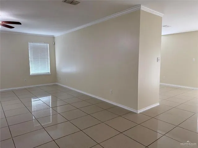 a view of an empty room and window