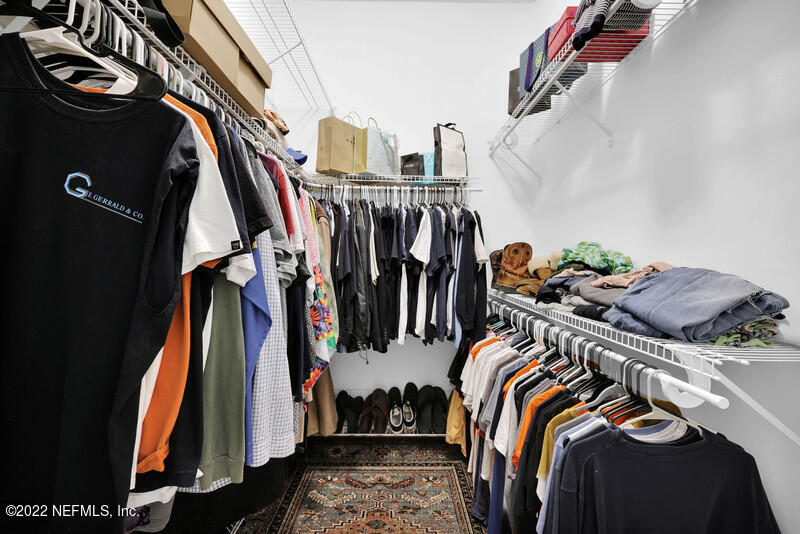 492 Big Tree Road Ponte Vedra Beach, FL 32082 - Photo 20 of 32 a view of walk in closet with clothes and shoes