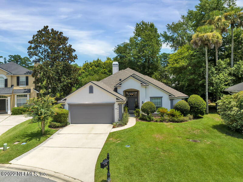 492 Big Tree Road Ponte Vedra Beach, FL 32082 - Photo 2 of 32 a front view of a house with a yard and garage