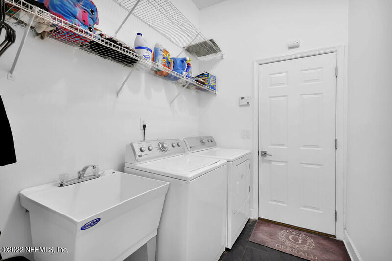 492 Big Tree Road Ponte Vedra Beach, FL 32082 - Photo 24 of 32 a utility room with dryer and washer