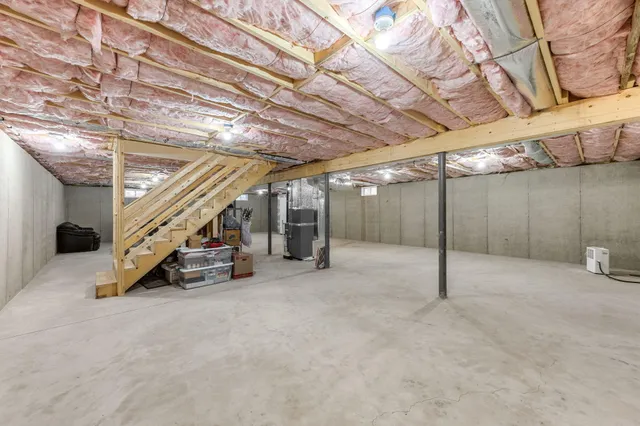 a view of an empty room with stairs