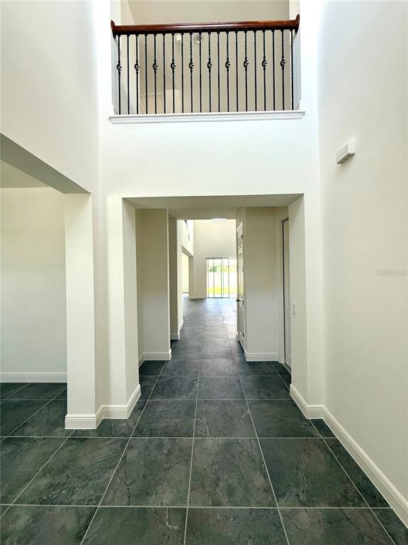 394 Switchgrass Loop Minneola, FL 34715 - Photo 6 of 26 a view of an entryway door