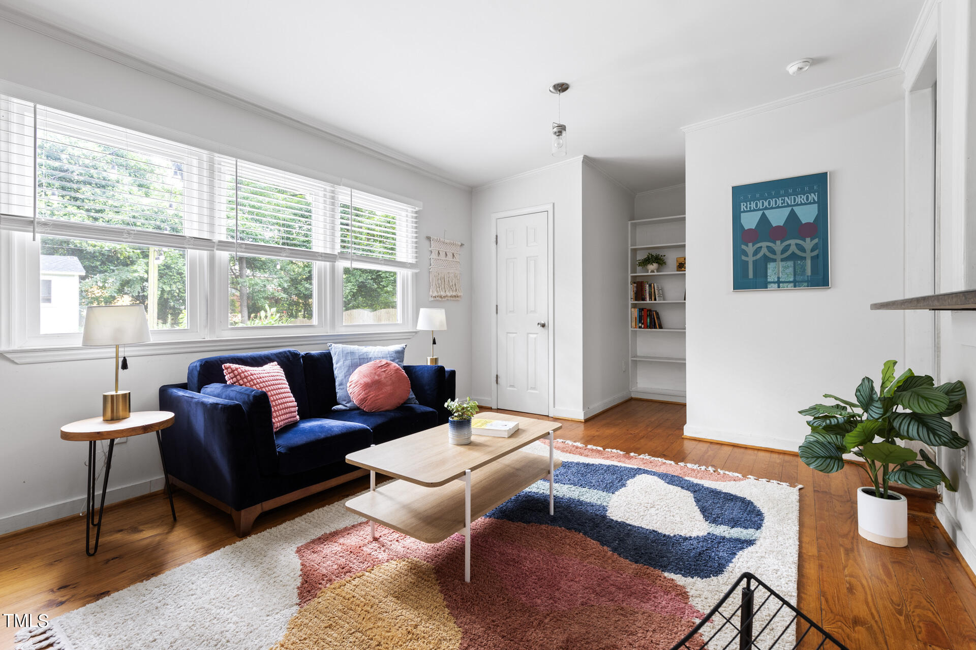 2035 Timber Drive Raleigh, NC 27604 - Photo 25 of 41 a living room with furniture and a large window