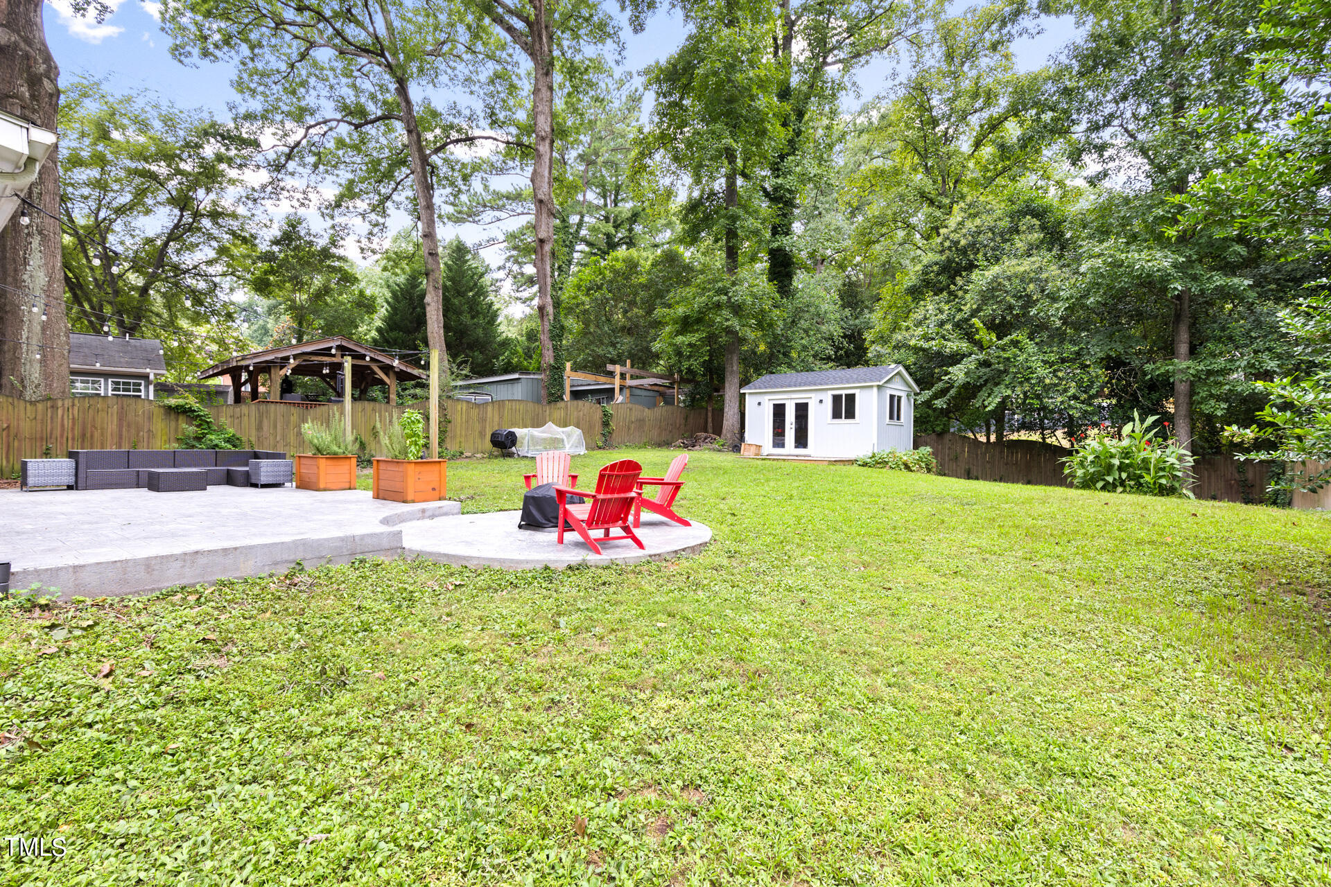 2035 Timber Drive Raleigh, NC 27604 - Photo 39 of 41 a view of a house with a backyard and a tree